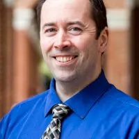 Headshot of John Hyland.